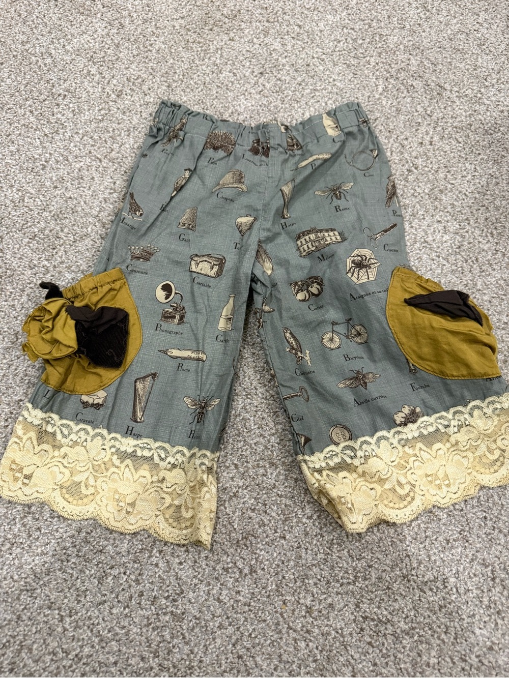 Persnickety Blue-Green Printed Kids Pants with Mustard Pocket Accents